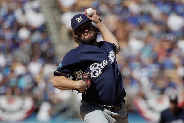 LOS ANGELES, CA - OCTOBER 17:  Pitcher Wade Miley #20 of the Milwaukee Brewers pitches during the first inning of Game Five of the National League Championship Series against the Los Angeles Dodgers at Dodger Stadium on October 17, 2018 in Los Angeles, California.  (Photo by Jae C. Hong-Pool/Getty Images)