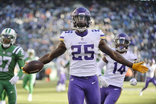 Minnesota Vikings running back Latavius Murray (25) celebrates after rushing for a 38-yard touchdown during the second half of an NFL football game against the New York Jets Sunday, Oct. 21, 2018, in East Rutherford, N.J. (AP Photo/Howard Simmons)