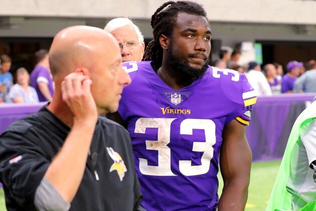 MINNEAPOLIS, MN - OCTOBER 1: Dalvin Cook #33 of the Minnesota Vikings walks into the locker room after getting injured on a play in the third quarter of the game against the Detroit Lions on October 1, 2017 at U.S. Bank Stadium in Minneapolis, Minnesota. (Photo by Adam Bettcher/Getty Images)