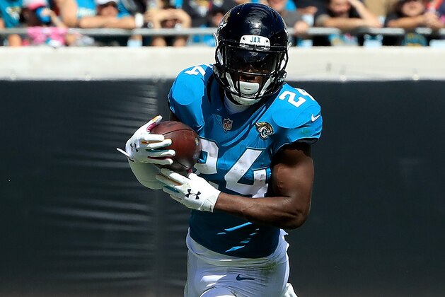 JACKSONVILLE, FL - OCTOBER 21:  T.J. Yeldon #24 of the Jacksonville Jaguars runs for yardage during the game against the Houston Texans at TIAA Bank Field on October 21, 2018 in Jacksonville, Florida.  (Photo by Sam Greenwood/Getty Images)