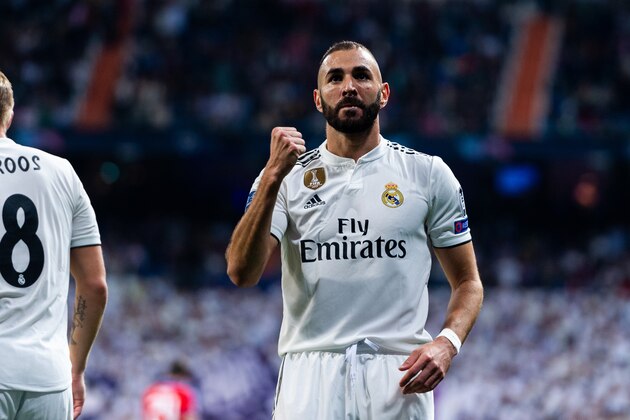 MADRID, SPAIN - OCTOBER 23: Karim Benzema, #9 of Real Madrid celebrates after scoring his team's first goal during the UEFA Champions League between Club Real Madrid and Viktoria Plzen at Santiago Bernabeu on October 23, 2018 in Madrid, Spain. (Photo by Sonia Canada/Getty Images)