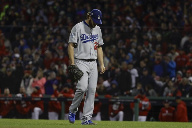 Los Angeles Dodgers starting pitcher Clayton Kershaw leaves the game during the fifth inning of Game 1 of the World Series baseball game against the Boston Red Sox Tuesday, Oct. 23, 2018, in Boston. (AP Photo/Matt Slocum)