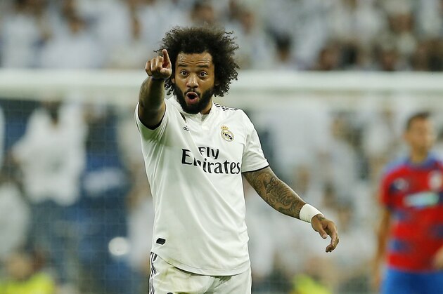 Real's Marcelo celebrates after scoring his side's second goal during the Champions League, group G, soccer match between Real Madrid and Viktoria Plzen at the Santiago Bernabeu stadium in Madrid, Spain, Tuesday Oct. 23, 2018. (AP Photo/Paul White)