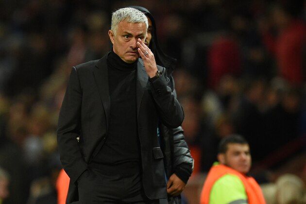 Manchester United's Portuguese manager Jose Mourinho leaves the pitch after the Champions League group H football match between Manchester United and Juventus at Old Trafford in Manchester, north west England, on October 23, 2018. - Juventus won the game 1-0. (Photo by Oli SCARFF / AFP)        (Photo credit should read OLI SCARFF/AFP/Getty Images)