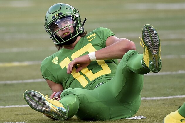 EUGENE, OR - SEPTEMBER 22: Quarterback Justin Herbert #10 of the Oregon Ducks falls to the truf in the third quarter of the game against the Oregon Ducks at Autzen Stadium on September 22, 2018 in Eugene, Oregon. Stanford won the game in overtime 38-31. (Photo by Steve Dykes/Getty Images)