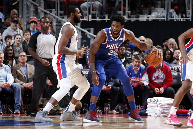 DETROIT, MI - OCTOBER 23: Joel Embiid #21 of the Philadelphia 76ers handles the ball against Andre Drummond #0 of the Detroit Pistons on October 23, 2018 at Little Caesars Arena in Auburn Hills, Michigan. NOTE TO USER: User expressly acknowledges and agrees that, by downloading and/or using this photograph, User is consenting to the terms and conditions of the Getty Images License Agreement. Mandatory Copyright Notice: Copyright 2018 NBAE (Photo by Brian Sevald/NBAE via Getty Images)