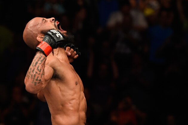 KANSAS CITY, MO - APRIL 15:  Demetrious Johnson celebrates his submission victory over Wilson Reis of Brazil in their UFC flyweight fight during the UFC Fight Night event at Sprint Center on April 15, 2017 in Kansas City, Missouri. (Photo by Josh Hedges/Zuffa LLC/Zuffa LLC via Getty Images)