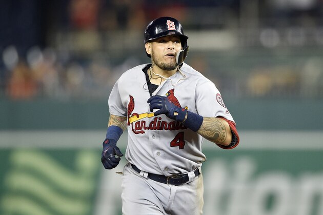 St. Louis Cardinals' Yadier Molina rounds the bases after his grand slam during a baseball game against the Washington Nationals, Tuesday, Sept. 4, 2018, in Washington. The Cardinals won 11-8. (AP Photo/Nick Wass)