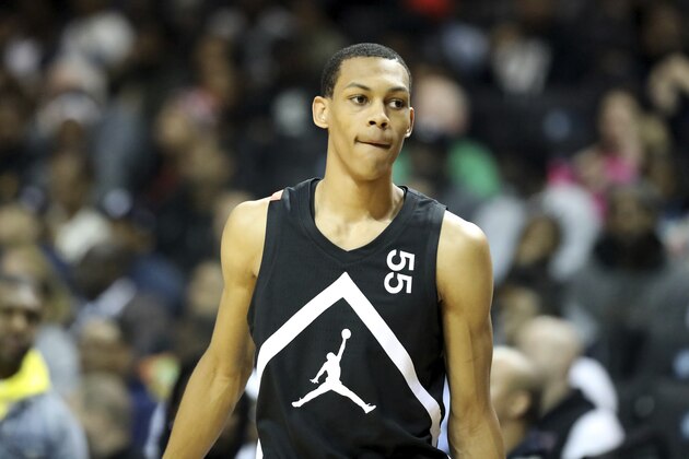 The Black Team's Darius Bazley #55 in action against the White Team during the Jordan Brand Classic high school basketball game, Sunday, April 8, 2018, in Brooklyn. (AP Photo/Gregory Payan)