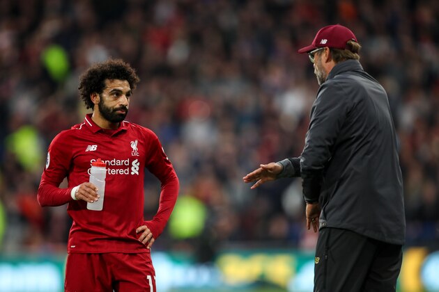 HUDDERSFIELD, ENGLAND - OCTOBER 20: Mohamed Salah of Liverpool and Jurgen Klopp manager / head coach of Liverpool  during the Premier League match between Huddersfield Town and Liverpool FC at John Smith's Stadium on October 20, 2018 in Huddersfield, United Kingdom. (Photo by Robbie Jay Barratt - AMA/Getty Images)