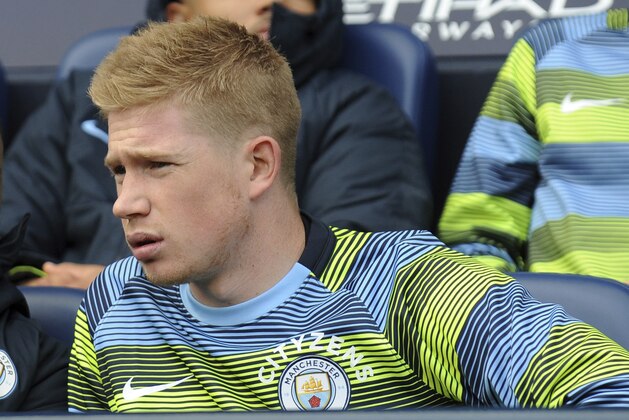 Manchester City's Kevin De Bruyne looks out from the bench prior the English Premier League soccer match between Manchester City and Burnley at Etihad stadium in Manchester, England, Saturday, Oct. 20, 2018. (AP Photo/Rui Vieira)