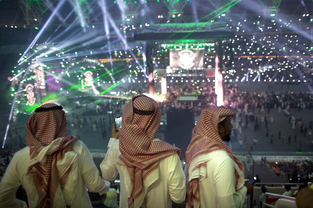 Fans film the opening of the