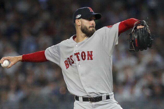 Boston Red Sox starting pitcher Rick Porcello delivers against the New York Yankees during the first inning of Game 4 of baseball's American League Division Series, Tuesday, Oct. 9, 2018, in New York. (AP Photo/Julie Jacobson)