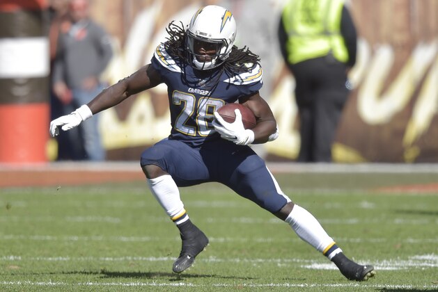 Los Angeles Chargers running back Melvin Gordon (28) rushes in the first half during an NFL football game against the Cleveland Browns, Sunday, Oct. 14, 2018, in Cleveland. (AP Photo/David Richard)