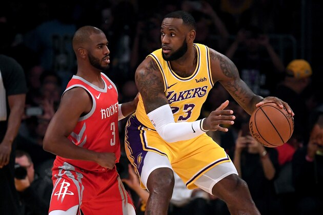 LOS ANGELES, CA - OCTOBER 20:  LeBron James #23 of the Los Angeles Lakers backs in on Chris Paul #3 of the Houston Rockets during a 124-115 Laker loss at Staples Center on October 20, 2018 in Los Angeles, California.  (Photo by Harry How/Getty Images)