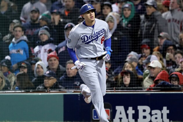 BOSTON, MA - OCTOBER 24:  Manny Machado #8 of the Los Angeles Dodgers reacts after scoring a run during the fourth inning against the Boston Red Sox in Game Two of the 2018 World Series at Fenway Park on October 24, 2018 in Boston, Massachusetts.  (Photo by Elsa/Getty Images)