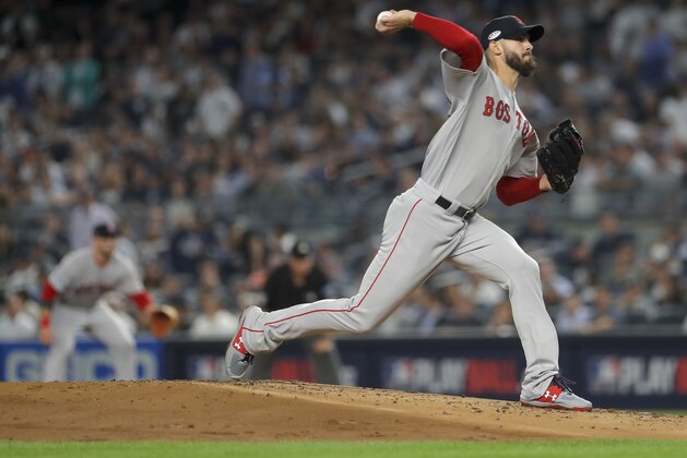 Boston Red Sox starting pitcher Rick Porcello delivers against the New York Yankees during the first inning of Game 4 of baseball's American League Division Series, Tuesday, Oct. 9, 2018, in New York. (AP Photo/Julie Jacobson)