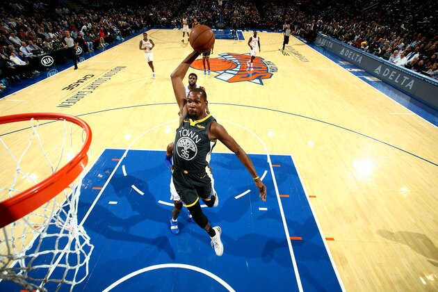 NEW YORK, NY - OCTOBER 26:  Kevin Durant #35 of the Golden State Warriors dunks the ball against the New York Knicks on October 26, 2018 at Madison Square Garden in New York City, New York.  NOTE TO USER: User expressly acknowledges and agrees that, by downloading and or using this photograph, User is consenting to the terms and conditions of the Getty Images License Agreement. Mandatory Copyright Notice: Copyright 2018 NBAE  (Photo by Nathaniel S. Butler/NBAE via Getty Images)