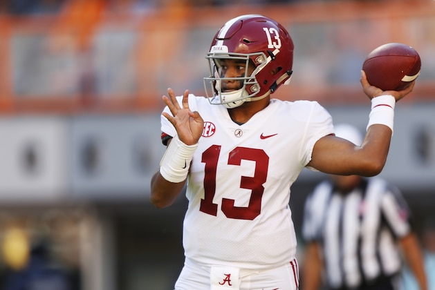 Alabama quarterback Tua Tagovailoa (13) throws to a receiver in the first half of an NCAA college football game against Tennessee Saturday, Oct. 20, 2018, in Knoxville, Tenn. (AP Photo/Wade Payne)