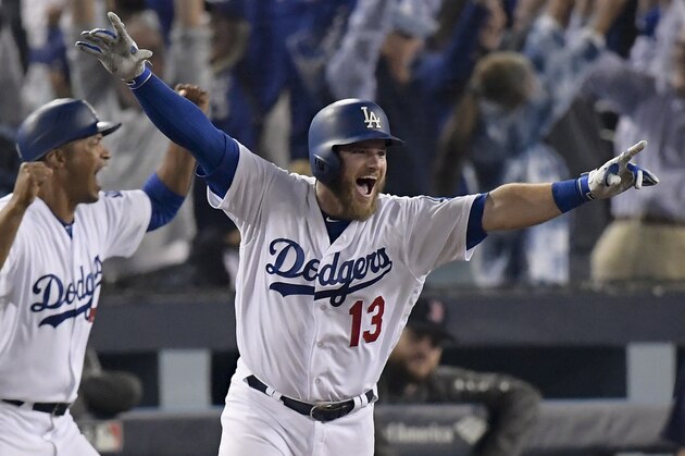 Los Angeles Dodgers' Max Muncy celebrates his walk off home run against the Boston Red Sox during the 18th inning in Game 3 of the World Series baseball game on Saturday, Oct. 27, 2018, in Los Angeles. (AP Photo/Mark J. Terrill)