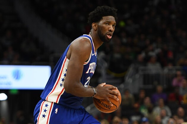 MILWAUKEE, WI - OCTOBER 24:  Joel Embiid #21 of the Philadelphia 76ers handles the ball during a game against the Milwaukee Bucks at the Fiserv Forum on October 24, 2018 in Milwaukee, Wisconsin. NOTE TO USER: User expressly acknowledges and agrees that, by downloading and or using this photograph, User is consenting to the terms and conditions of the Getty Images License Agreement.  (Photo by Stacy Revere/Getty Images)