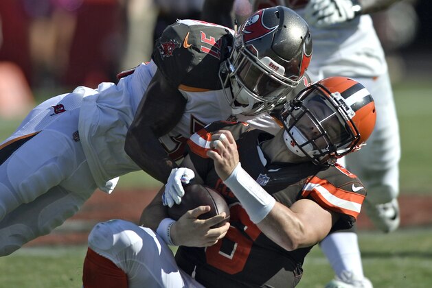 Tampa Bay Buccaneers defensive back Jordan Whitehead (31) hits Cleveland Browns quarterback Baker Mayfield (6) during the second half of an NFL football game Sunday, Oct. 21, 2018, in Tampa, Fla. A person familiar with NFL discipline says Tampa Bay safety Jordan Whitehead is expected to be fined for his helmet-to-helmet hit on Browns quarterback Baker Mayfield. Whitehead struck a sliding Mayfield in the fourth quarter and should've been flagged for unnecessary roughness or unsportsmanlike conduct, said the person who spoke Wednesday, Oct. 24, 2018, to the Associated Press on condition of anonymity because the league has not commented on calls from last week’s games. (AP Photo/Jason Behnken) Tampa Bay Buccaneers defensive back Jordan Whitehead (31) hits Cleveland Browns quarterback Baker Mayfield (6) during the second half of an NFL football game Sunday, Oct. 21, 2018, in Tampa, Fla. A person familiar with NFL discipline says Tampa Bay safety Jordan Whitehead is expected to be fined for his helmet-to-helmet hit on Browns quarterback Baker Mayfield. Whitehead struck a sliding Mayfield in the fourth quarter and should've been flagged for unnecessary roughness or unsportsmanlike conduct, said the person who spoke Wednesday, Oct. 24, 2018, to the Associated Press on condition of anonymity because the league has not commented on calls from last week’s games. (AP Photo/Jason Behnken)