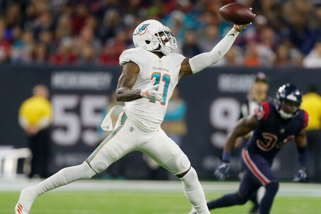 HOUSTON, TX - OCTOBER 25:  DeVante Parker #11 of the Miami Dolphins makes a one handed catch in the fourth quarter against the Houston Texans at NRG Stadium on October 25, 2018 in Houston, Texas.  (Photo by Bob Levey/Getty Images)