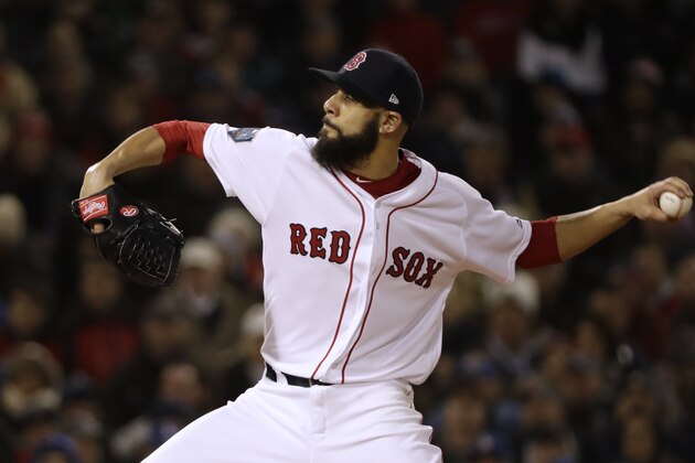 Boston Red Sox's starting pitcher David Price winds up to throw during the first inning of Game 2 of the World Series baseball against the Los Angeles Dodgers game Wednesday, Oct. 24, 2018, in Boston. (AP Photo/David J. Phillip)