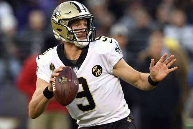 FILE - In this Oct. 21, 2018, file photo, New Orleans Saints quarterback Drew Brees looks for a receiver in the second half of an NFL football game against the Baltimore Ravens, in Baltimore. The Saints play at the Minnesota Vikings on Sunday, Oct. 28. (AP Photo/Nick Wass, File)