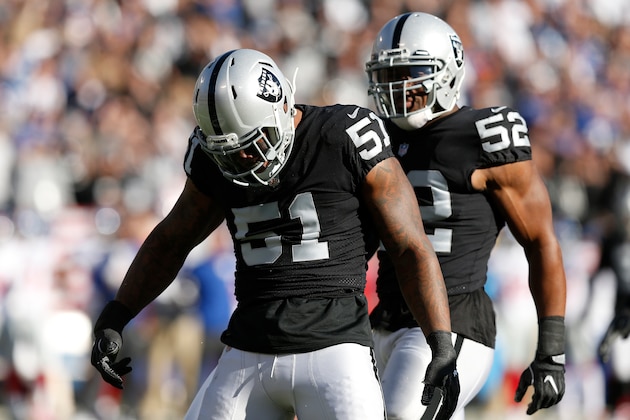 OAKLAND, CA - DECEMBER 03:  Bruce Irvin #51 and Khalil Mack #52 of the Oakland Raiders celebrate after a play against the New York Giants during their NFL game at Oakland-Alameda County Coliseum on December 3, 2017 in Oakland, California.  (Photo by Lachlan Cunningham/Getty Images)
