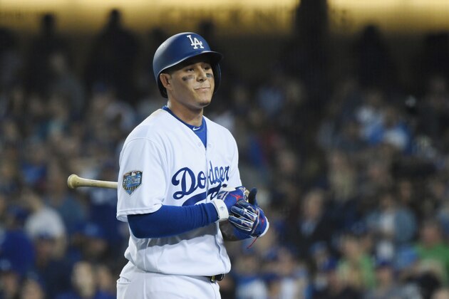 LOS ANGELES, CA - OCTOBER 26:  Manny Machado #8 of the Los Angeles Dodgers reacts after flying out during the thirteenth inning against the Boston Red Sox in Game Three of the 2018 World Series at Dodger Stadium on October 26, 2018 in Los Angeles, California.  (Photo by Harry How/Getty Images)