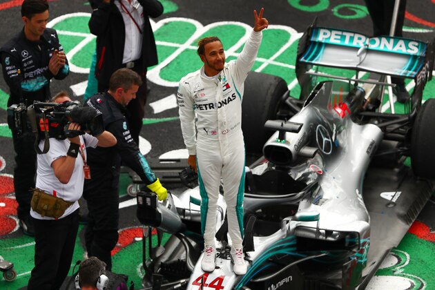 MEXICO CITY, MEXICO - OCTOBER 28:  Fourth place finisher Lewis Hamilton of Great Britain and Mercedes GP celebrates winning the 2018 F1 World Drivers Championship after the Formula One Grand Prix of Mexico at Autodromo Hermanos Rodriguez on October 28, 2018 in Mexico City, Mexico.  (Photo by Dan Istitene/Getty Images)