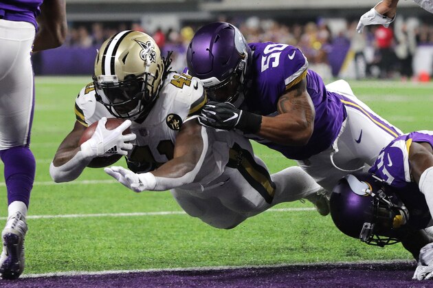 MINNEAPOLIS, MN - OCTOBER 28: Alvin Kamara #41 of the New Orleans Saints dives with the ball into the end zone for a touchdown in the first quarter of the game against the Minnesota Vikings at U.S. Bank Stadium on October 28, 2018 in Minneapolis, Minnesota. (Photo by Adam Bettcher/Getty Images)