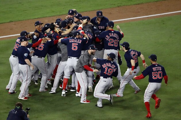 LOS ANGELES, CA - OCTOBER 28:  The Boston Red Sox celebrate their 5-1 win over the Los Angeles Dodgers in Game Five to win the 2018 World Series at Dodger Stadium on October 28, 2018 in Los Angeles, California.  (Photo by Ezra Shaw/Getty Images)