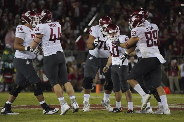 Washington State kicker Blake Mazza (40) and his teammates celebrate after he made the winning field goal in the second half against Stanford during an NCAA college football game on Saturday, Oct. 27, 2018, in Stanford, Calif. (AP Photo/Don Feria)