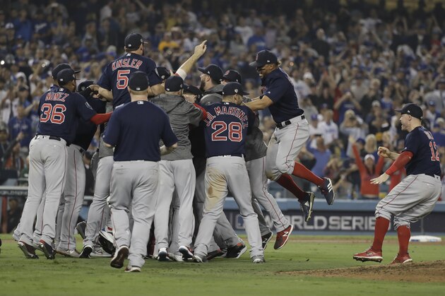 The Boston Red Sox celebrate after Game 5 of baseball's World Series against the Los Angeles Dodgers on Sunday, Oct. 28, 2018, in Los Angeles. The Red Sox won 5-1 to win the series 4 game to 1. (AP Photo/David J. Phillip)