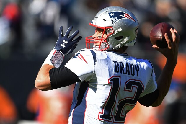 CHICAGO, IL - OCTOBER 21:  Tom Brady #12 of the New England Patriots participates in warmups prior to a game against the Chicago Bears at Soldier Field on October 21, 2018 in Chicago, Illinois.  The Patriots defeated the Bears 38-31.  (Photo by Stacy Revere/Getty Images)
