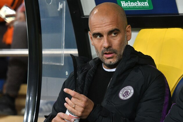 Manchester City's Spanish coach Josep Guardiola reacts during the UEFA Champions League football match between Shakhtar Donetsk and Manchester City at the Metallist stadium in Kharkiv, on October 23, 2018. (Photo by GENYA SAVILOV / AFP)        (Photo credit should read GENYA SAVILOV/AFP/Getty Images)