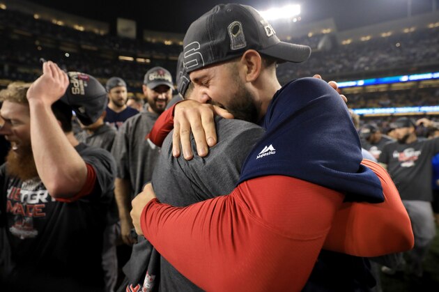 LOS ANGELES, CA - OCTOBER 28:  Hector Velazquez and Rick Porcello #22 of the Boston Red Sox celebrate with their team's 5-1 win over the Los Angeles Dodgers in Game Five of the 2018 World Series at Dodger Stadium on October 28, 2018 in Los Angeles, California.  (Photo by Sean M. Haffey/Getty Images)