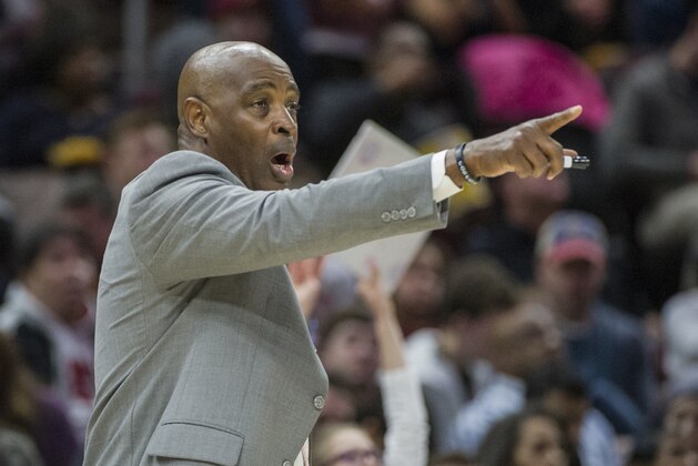 Cleveland Cavaliers interim head coach Larry Drew calls a play against the Dallas Mavericks during the second half of an NBA basketball game in Cleveland, Sunday, April 1, 2018. (AP Photo/Phil Long)