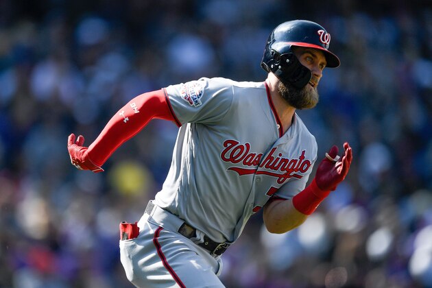 DENVER, CO - SEPTEMBER 30:  Bryce Harper #34 of the Washington Nationals runs out a fourth inning double against the Colorado Rockies at Coors Field on September 30, 2018 in Denver, Colorado.  (Photo by Dustin Bradford/Getty Images)