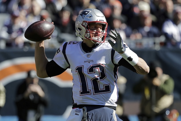 New England Patriots quarterback Tom Brady (12) throws a pass during the first half of an NFL football game against the Chicago Bears Sunday, Oct. 21, 2018, in Chicago. (AP Photo/Nam Y. Huh)