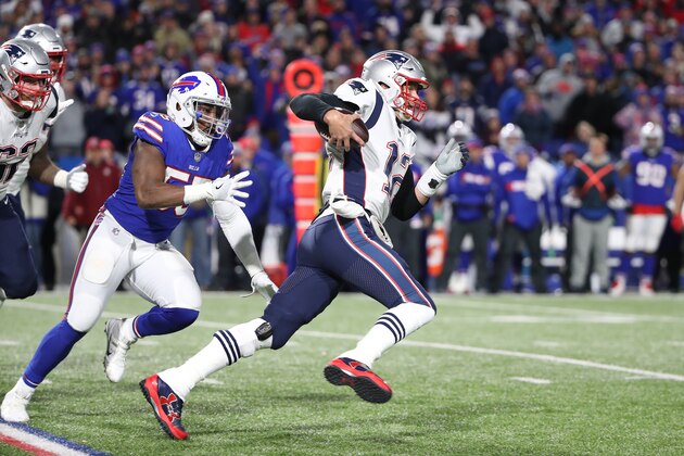 BUFFALO, NY - OCTOBER 29: Tom Brady #12 of the New England Patriots runs with the ball during NFL game action against the Buffalo Bills at New Era Field on October 29, 2018 in Buffalo, New York. (Photo by Tom Szczerbowski/Getty Images)