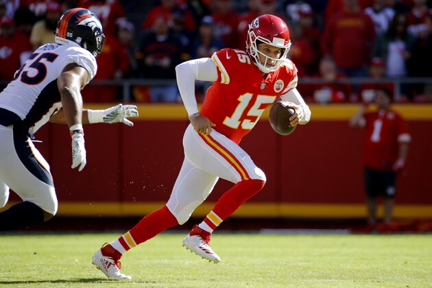 Kansas City Chiefs quarterback Patrick Mahomes runs the ball during the first half of an NFL football game against the Denver Broncos Sunday, Oct. 28, 2018, in Kansas City, Mo. (AP Photo/Charlie Riedel)