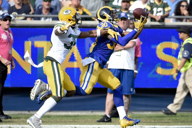 Los Angeles Rams running back Todd Gurley, right, makes a catch as Green Bay Packers defensive back Jermaine Whitehead defends during the first half of an NFL football game, Sunday, Oct. 28, 2018, in Los Angeles. (AP Photo/Denis Poroy) Los Angeles Rams running back Todd Gurley, right, makes a catch as Green Bay Packers defensive back Jermaine Whitehead defends during the first half of an NFL football game, Sunday, Oct. 28, 2018, in Los Angeles. (AP Photo/Denis Poroy)