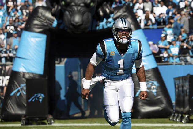 Carolina Panthers' Quarterback Cam Newton (1) takes the field prior to the start of an NFL football game against the Baltimore Ravens in Charlotte, N.C., Sunday, Oct. 28, 2018. (AP Photo/Ben McKeown)