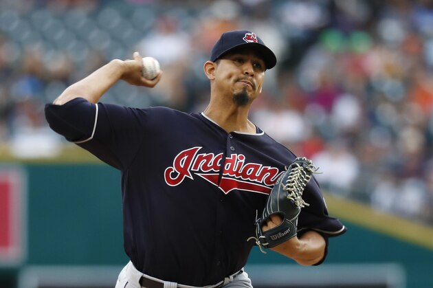 Cleveland Indians pitcher Carlos Carrasco throws against the Detroit Tigers in the first inning of a baseball game in Detroit, Friday, July 27, 2018. (AP Photo/Paul Sancya)