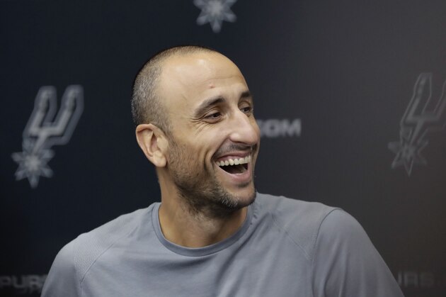 Former San Antonio Spurs guard Manu Ginobili jokes with the media at the NBA basketball team's practice facility, Saturday, Sept. 15, 2018, in San Antonio. Ginobili recently retired at age 41 after 16 seasons with the Spurs and helping them win four NBA championships. (AP Photo/Eric Gay)