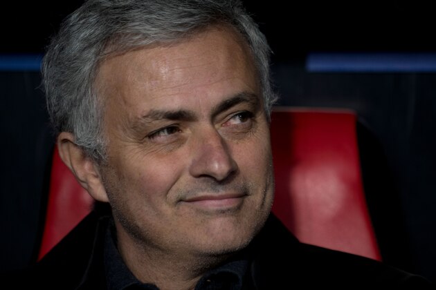 Manchester United's Portuguese head coach Jose Mourinho smiles during the UEFA Champions League round of 16 first leg football match Sevilla FC against Manchester United at the Ramon Sanchez Pizjuan stadium in Sevilla on February 21, 2018. / AFP PHOTO / JORGE GUERRERO        (Photo credit should read JORGE GUERRERO/AFP/Getty Images)