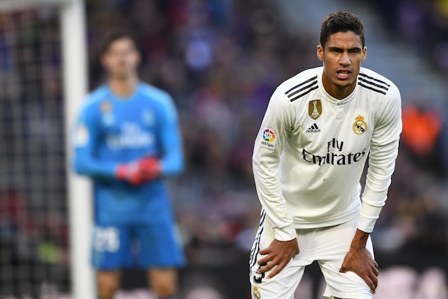 Real Madrid's French defender Raphael Varane looks on during the Spanish league football match between FC Barcelona and Real Madrid CF at the Camp Nou stadium in Barcelona on October 28, 2018. (Photo by GABRIEL BOUYS / AFP)        (Photo credit should read GABRIEL BOUYS/AFP/Getty Images)